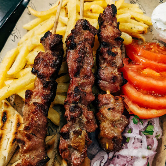 Фото вкусный и сочныйШашлык из свинины в духовке на противне в домашних условиях